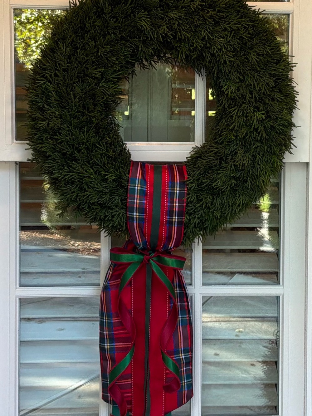 Festive Green Holiday Wreath with Red Plaid Bow